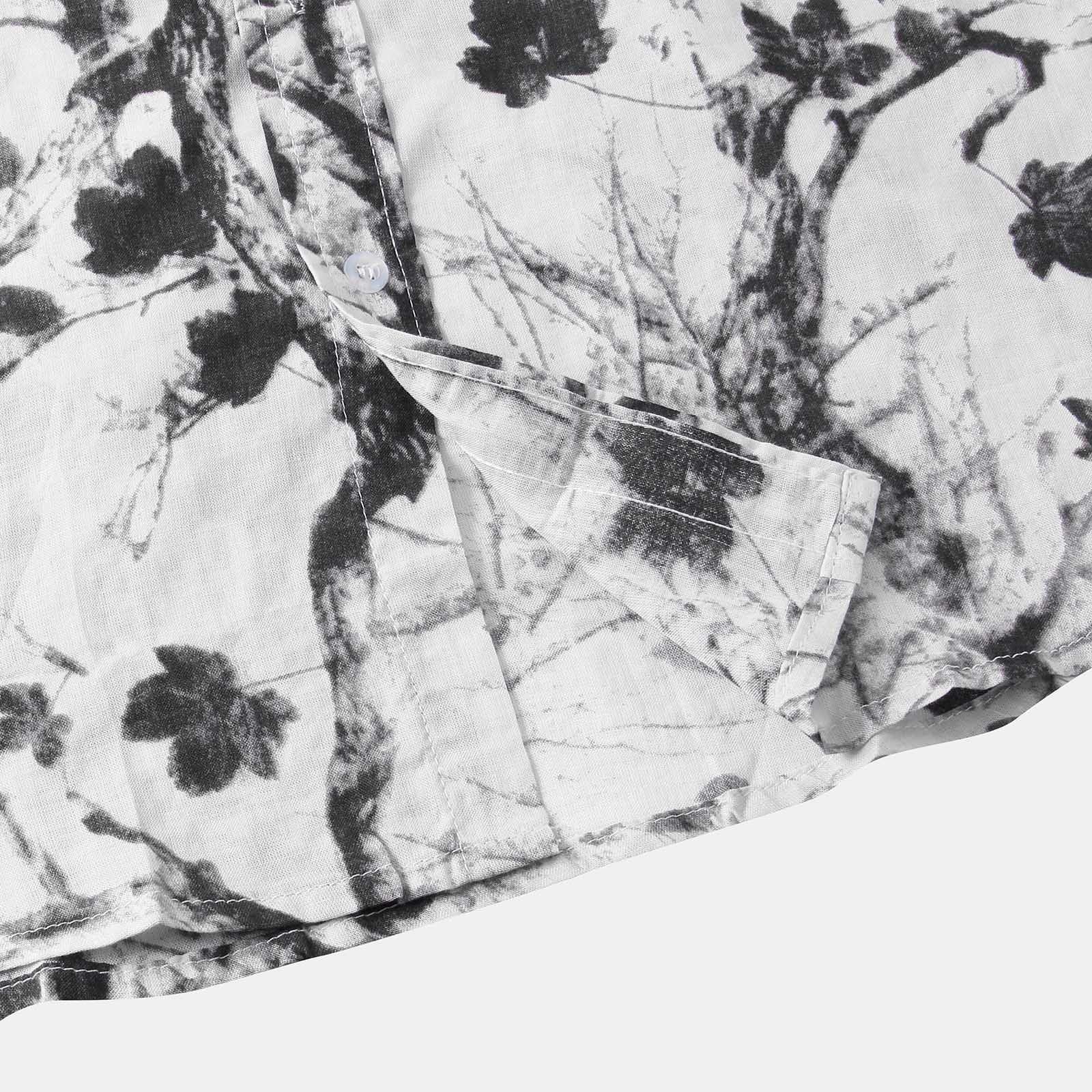 Camisa Manga Curta Estampada Marcanzzi Floral MZ569 branca com estampa floral preta, tecido leve e respirável, caimento confortável e moderno.