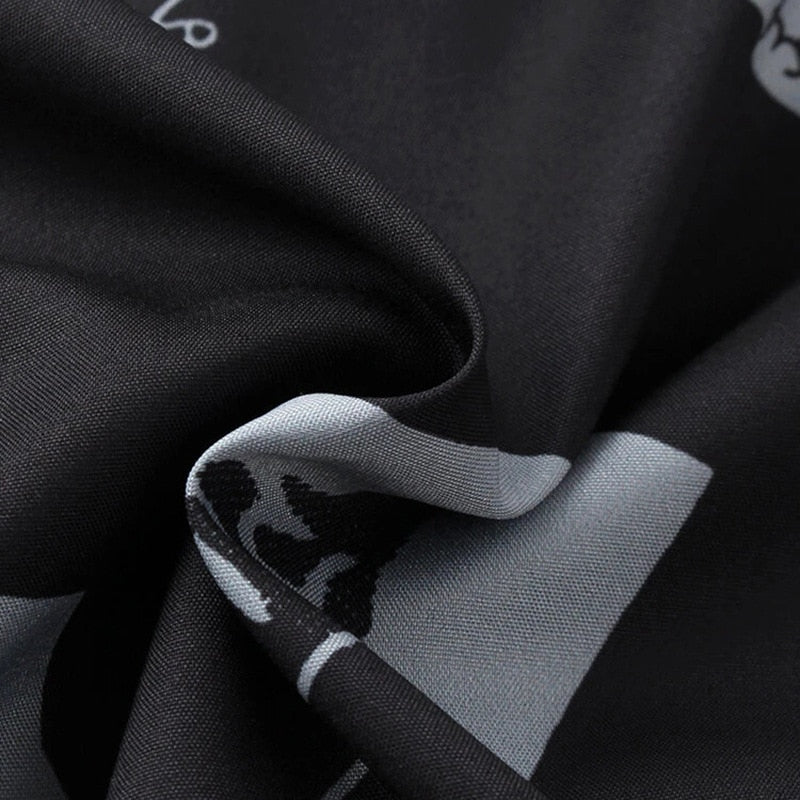 Camisa Manga Curta Marcanzzi Nation MZ584 preta com estampa branca criativa, tecido leve e confortável, estilo moderno e versátil para diferentes produções.