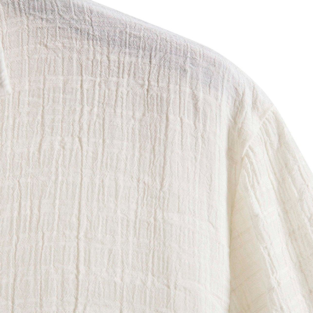 Camisa Manga Curta Marcanzzi Playa Off White MZ586 em tecido leve e respirável, design minimalista e caimento elegante para estilo casual sofisticado.