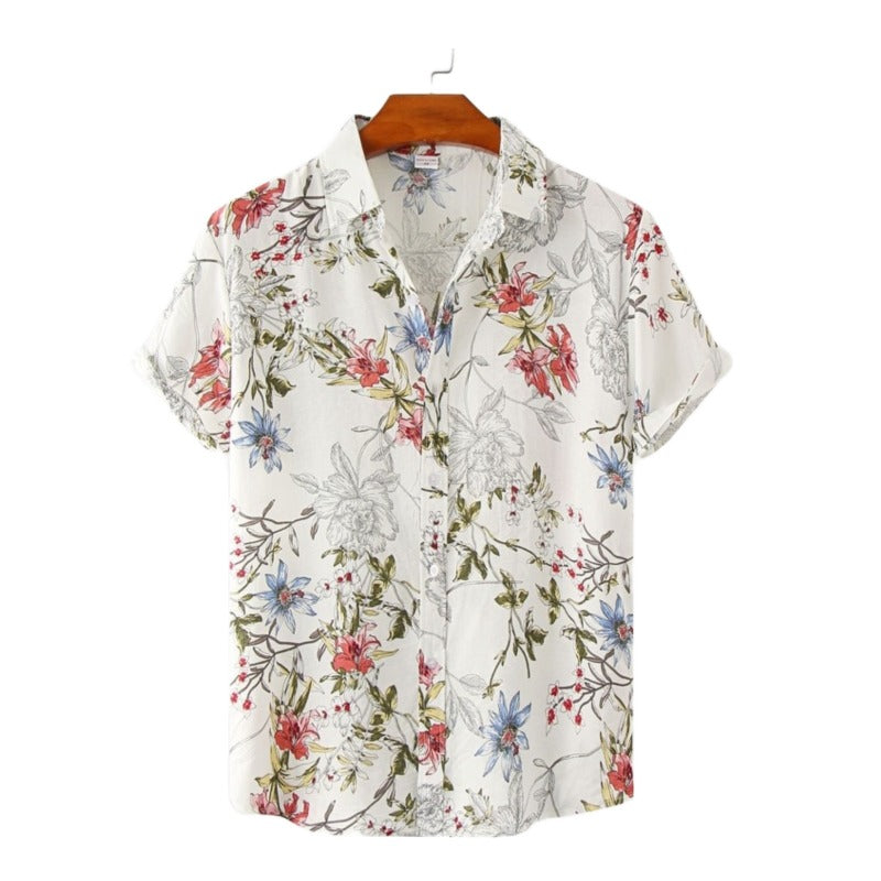 Camisa Manga Curta Marcanzzi Verona MZ591 com estampa floral em verde, azul e vermelho sobre fundo claro, tecido leve, fresco e confortável.