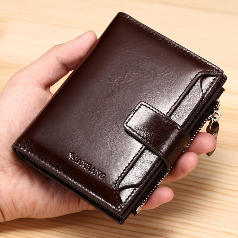 Carteira Masculina de Couro Manbag Marcanzzi RZ478 feita em couro premium com zíper, bolsos internos e acabamento sofisticado para organização prática.