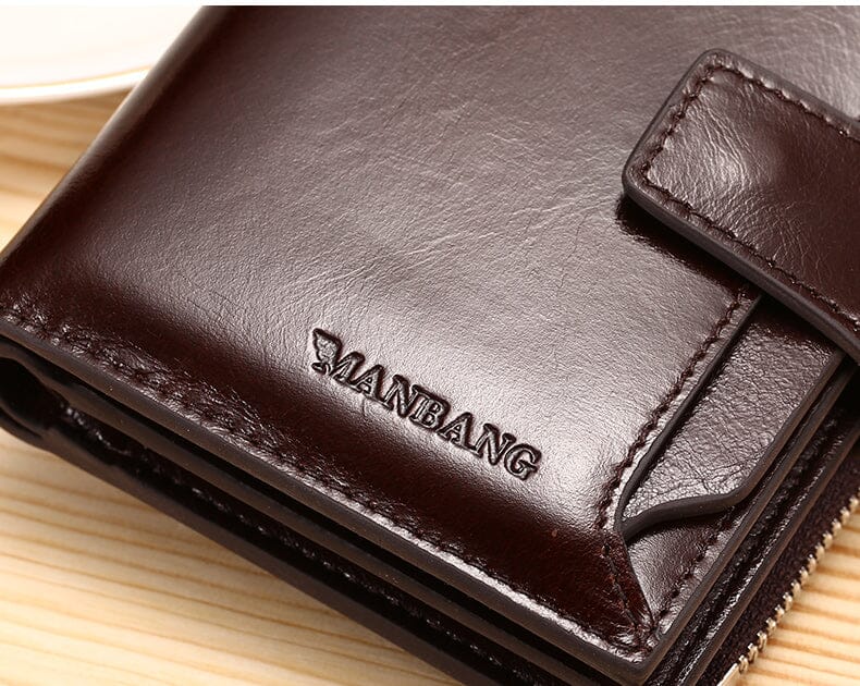 Carteira Masculina de Couro Manbag Marcanzzi RZ478 feita em couro premium com zíper, bolsos internos e acabamento sofisticado para organização prática.