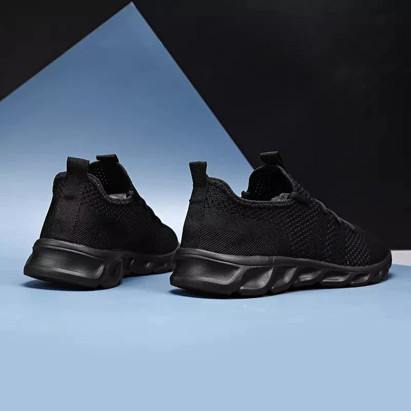 Tênis Confort Max Marcanzzi MZ433 com malha respirável, solado ergonômico e sola antiderrapante para conforto, segurança e frescor diário.