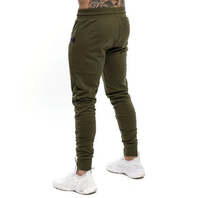 Calça Moletom Fitness Masculina Marcanzzi MZ315 em algodão premium, com cintura ajustável, bolsos com zíper e design moderno para treinos e casual.