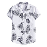 Camisa Manga Curta Marcanzzi Ipanema MZ579 branca com estampa tropical de folhas pretas, tecido leve e respirável, caimento confortável e moderno.