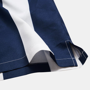 Camisa Manga Curta Marcanzzi Ocean MZ585 com listras verticais azul-marinho e branco, tecido leve, caimento confortável e design moderno versátil.