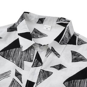 Camisa Manga Curta Marcanzzi Siena MZ588 em preto e branco com estampa geométrica, tecido leve e confortável, estilo moderno e versátil.