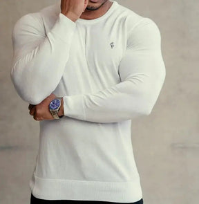 Suéter Masculino Marcanzzi MZ047 em lã superfina, elegante e confortável, com design atemporal e logotipo discreto. Ideal para looks casuais e formais.