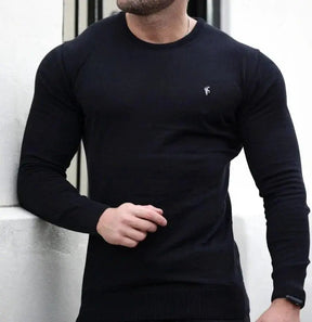 Suéter Masculino Marcanzzi MZ047 em lã superfina, elegante e confortável, com design atemporal e logotipo discreto. Ideal para looks casuais e formais.